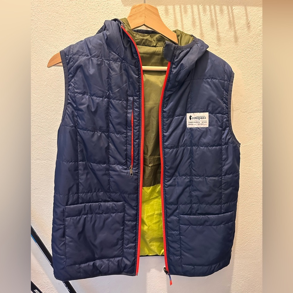 Reversible hooded vest